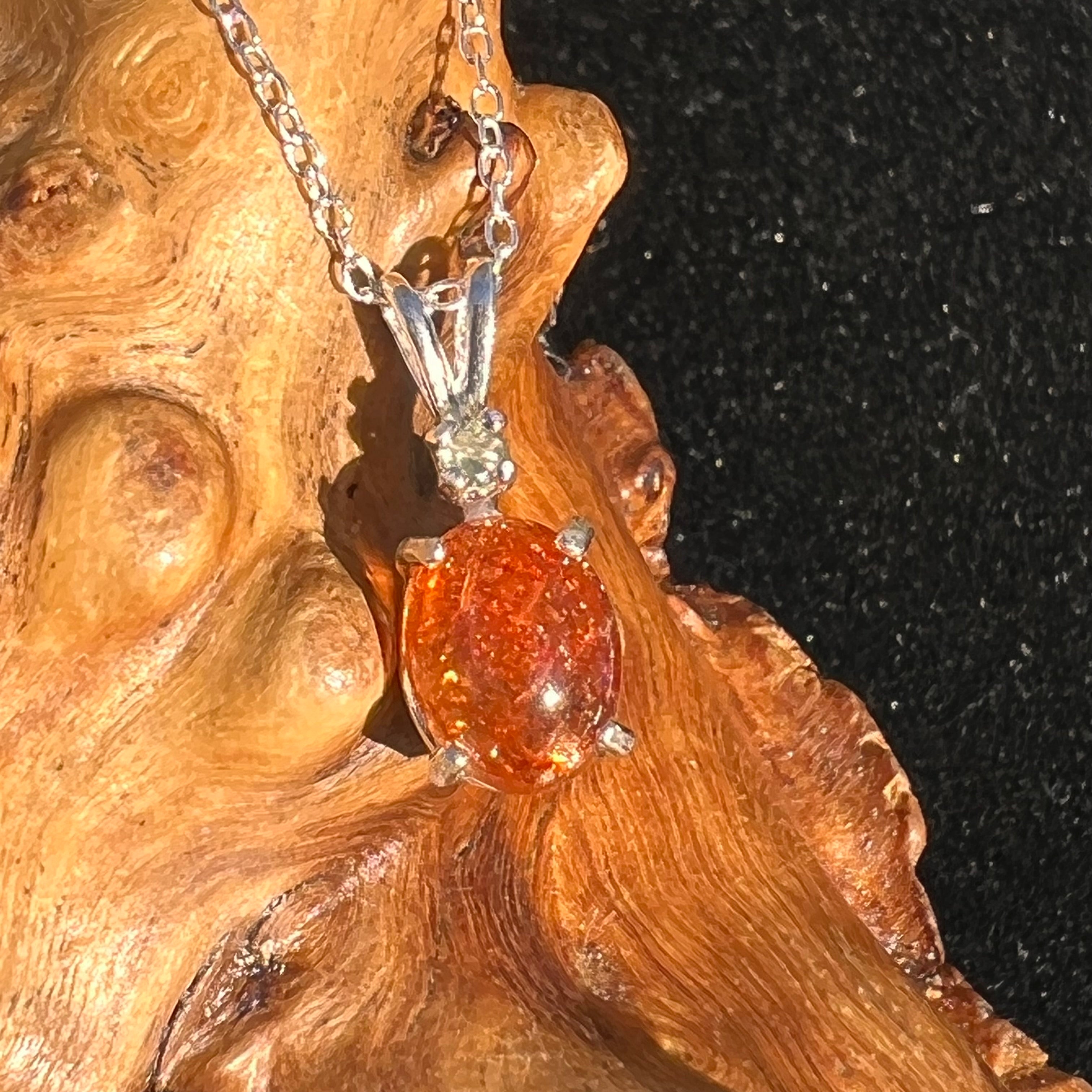 Store Amber and Moldavite Pendant