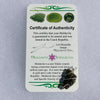 Moldavite sterling silver pendant displayed on our certificate of authenticity