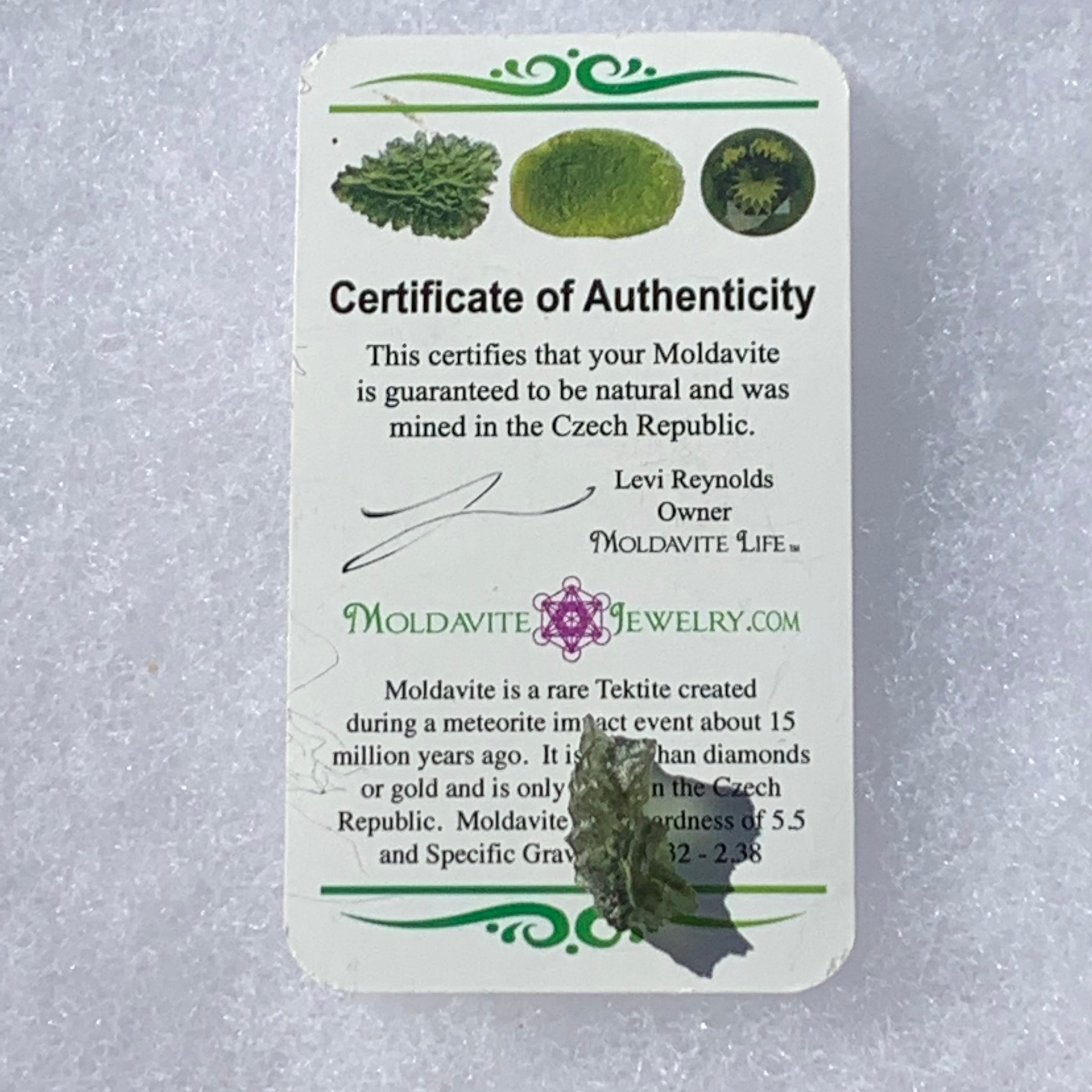 thin green besednice moldavite tektite with a moldavite life certificate of authenticity