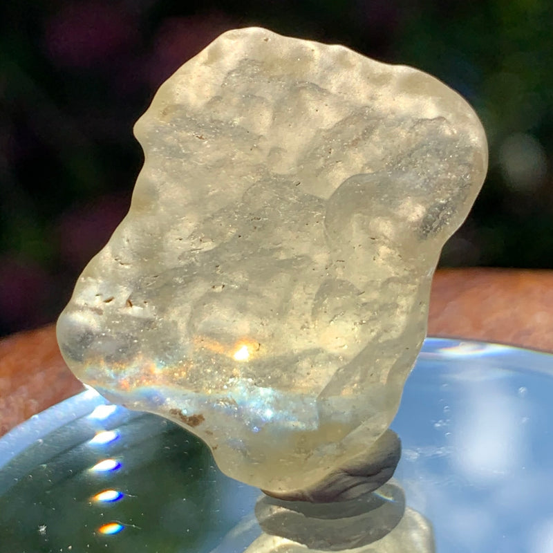 light shines through the libyan desert glass on display