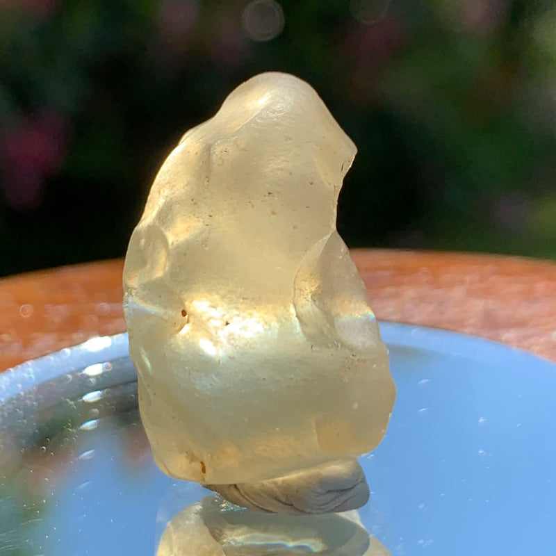 light shines through the libyan desert glass on display