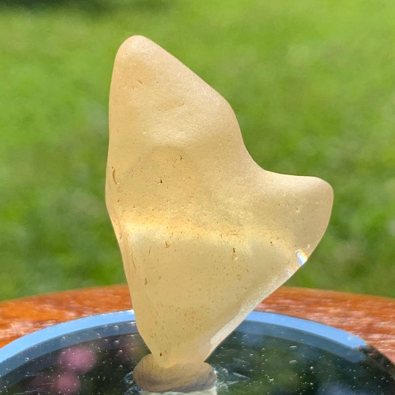 light shines through the libyan desert glass on display