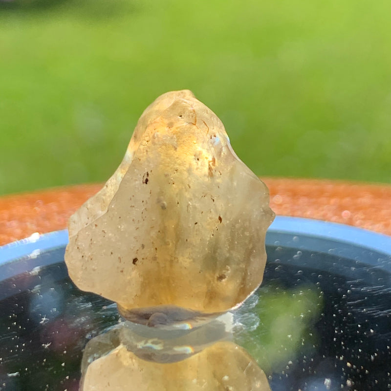 light shines through the libyan desert glass on display