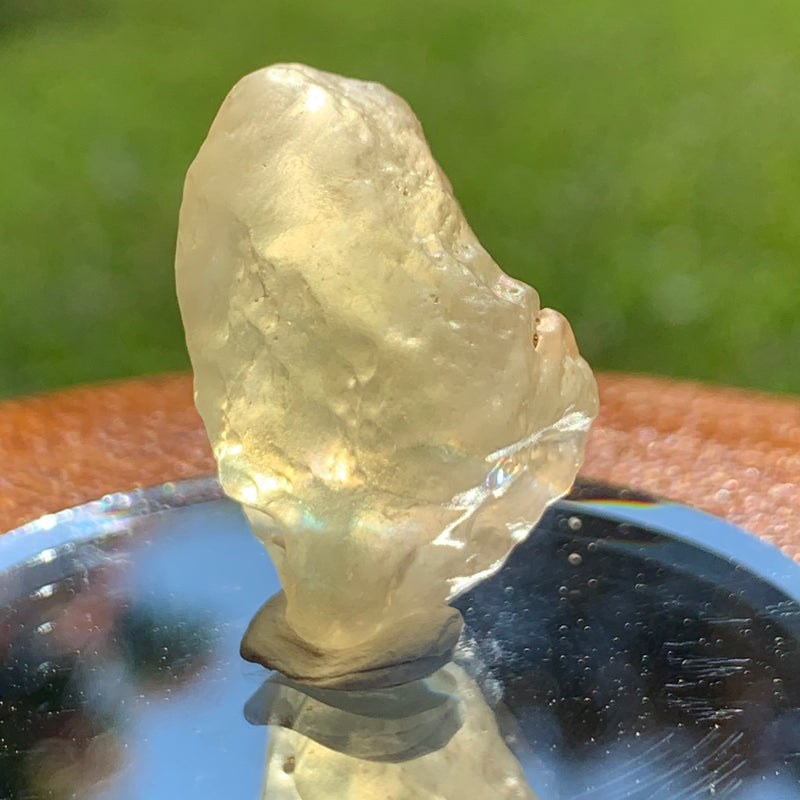 light shines through the libyan desert glass on display