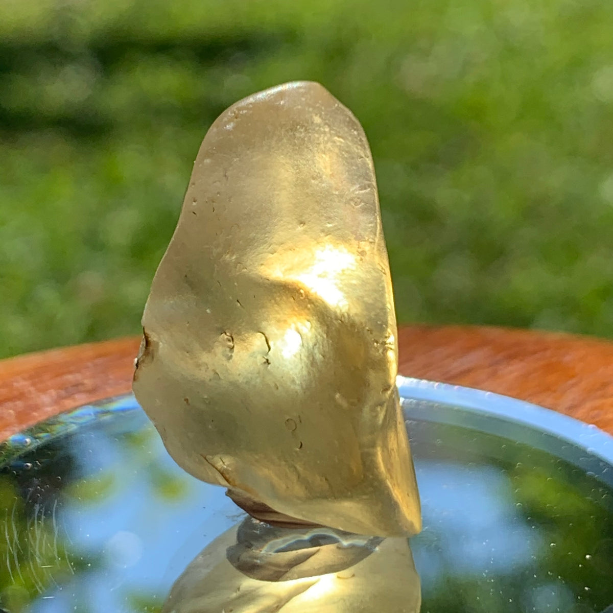 light shines through the libyan desert glass on display