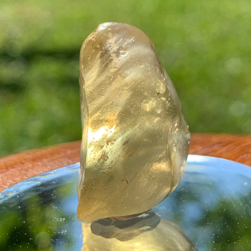 light shines through the libyan desert glass on display