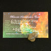 libyan desert glass sits with a moldavite life meteorite identification card