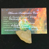 libyan desert glass sits with a moldavite life meteorite identification card