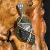 moldavite wire wrapped with a herkimer diamond in sterling silver with a sterling bail