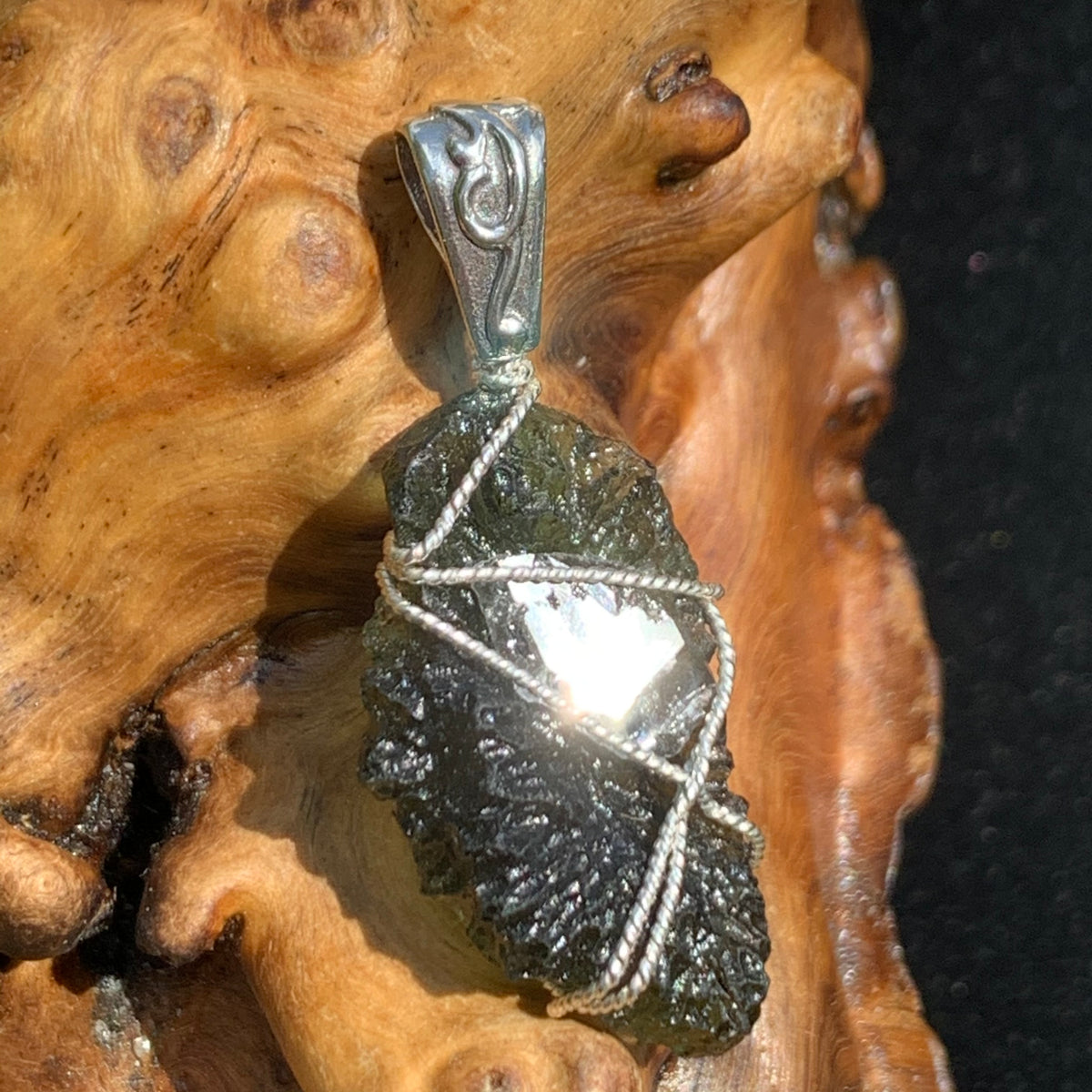 moldavite wire wrapped with a herkimer diamond in sterling silver with a sterling bail