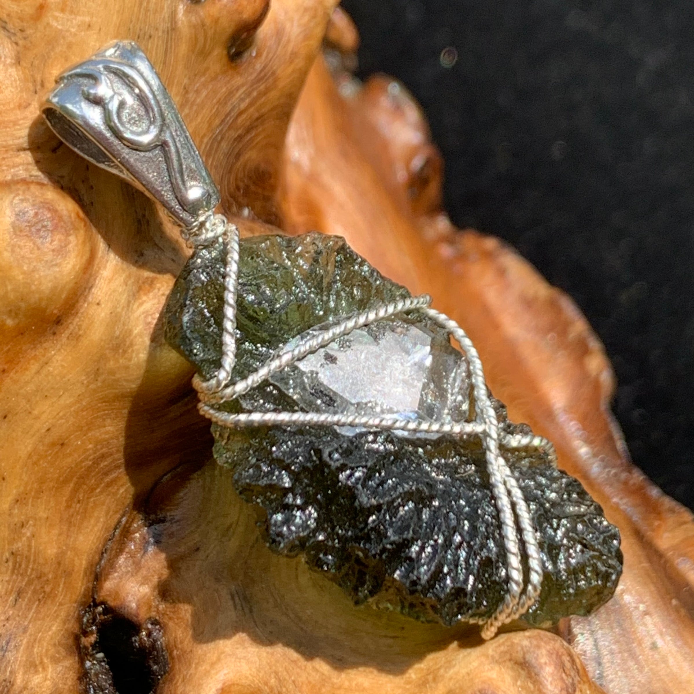 moldavite wire wrapped with a herkimer diamond in sterling silver with a sterling bail