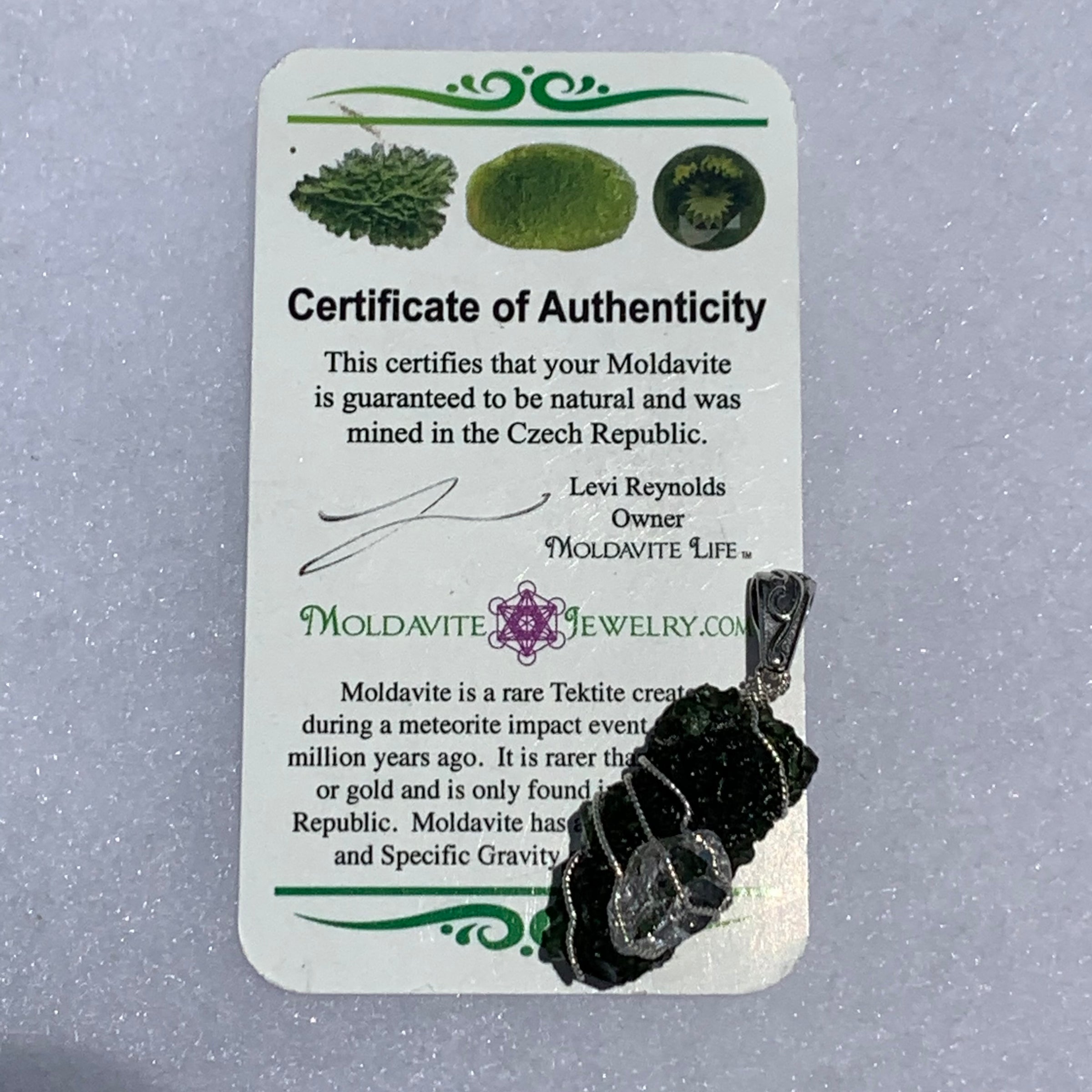 the pendant comes with a certificate of authenticity for the moldavite from moldavite life