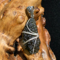 this sterling wire pendant features beautiful moldavite