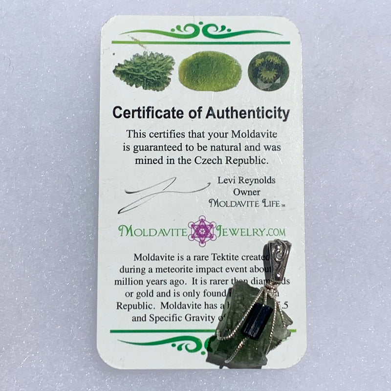 raw moldavite tektite and black tourmaline sterling silver wire wrapped pendant with a moldavite life certificate of authenticity