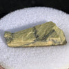 close up view of tatahouine meteorite in gem jar