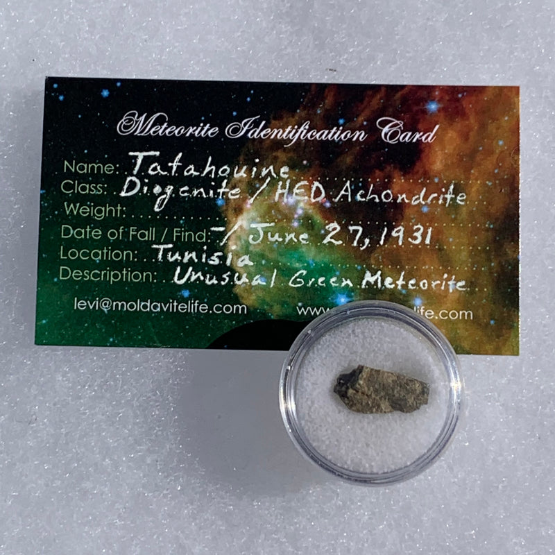 tatahouine meteorite in gem jar with a moldavite life meteorite identification card