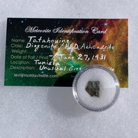 tatahouine meteorite in gem jar with a moldavite life meteorite identification card